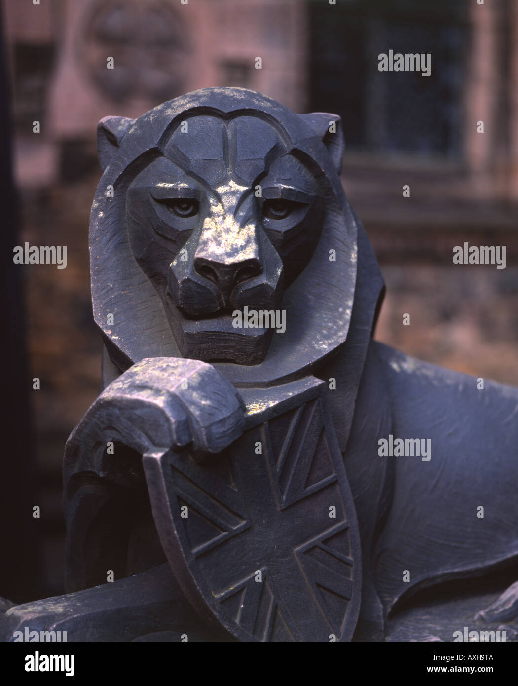 Stein-Löwen hält der britische Union Jack-Flagge am Edinburgh Castle Stockfoto