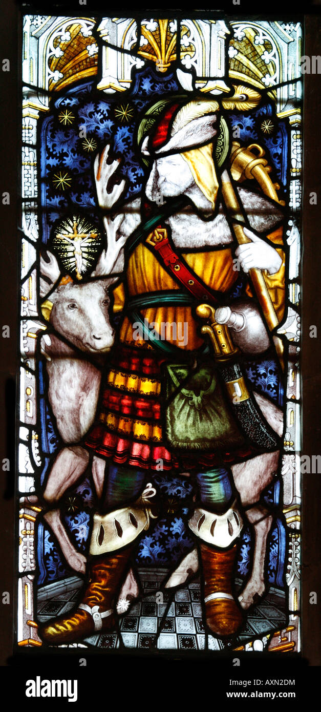 Buntglasfenster der Kempe Studios installiert 1891; Saint Hubert Patron Saint of Hunters, St Leonard's Church, Charlecote, Warwickshire Stockfoto