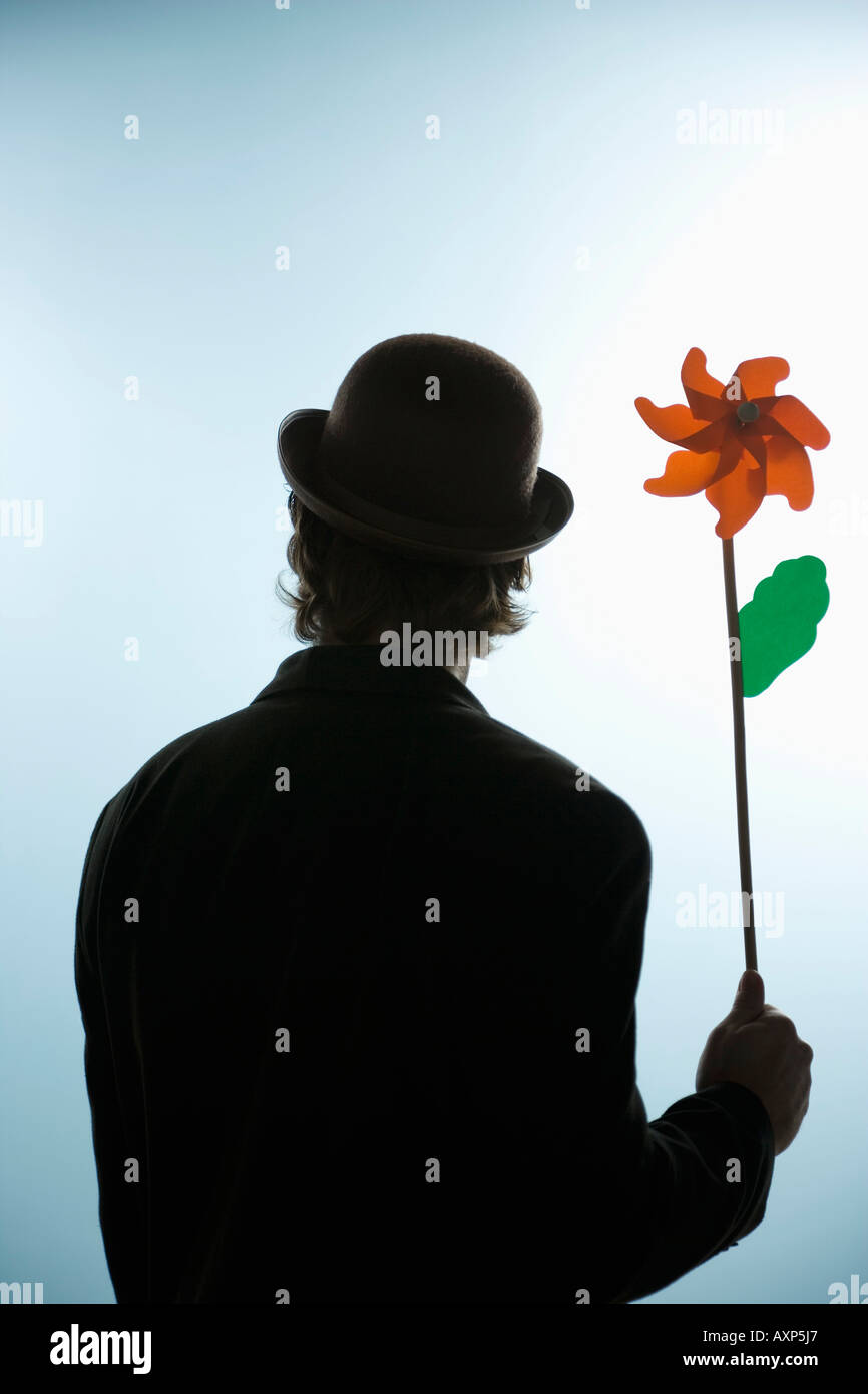 Person, die Blume Pin Rad Stockfoto