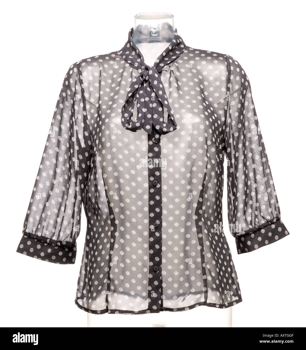 Schwarz / weiß getupft Bluse mit Krawatte Stockfoto
