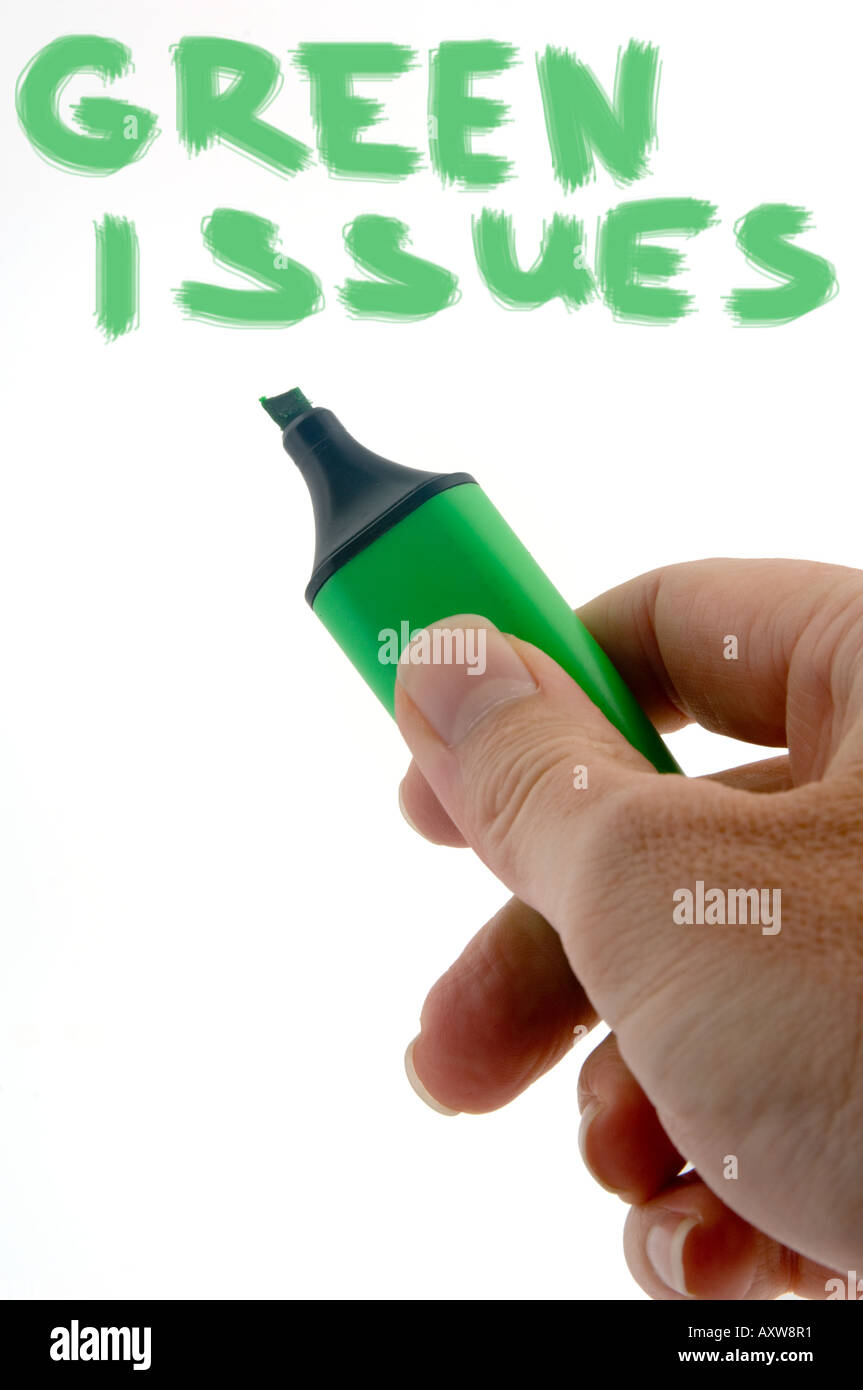 Hand mit einem grünen Filzstift Textmarker schreiben grüne Themen Stockfoto