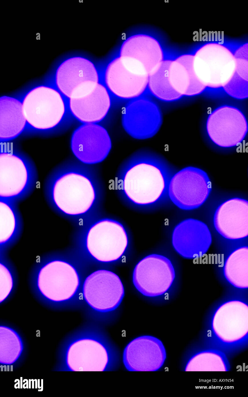 Lichtpunkte in lila Stockfoto