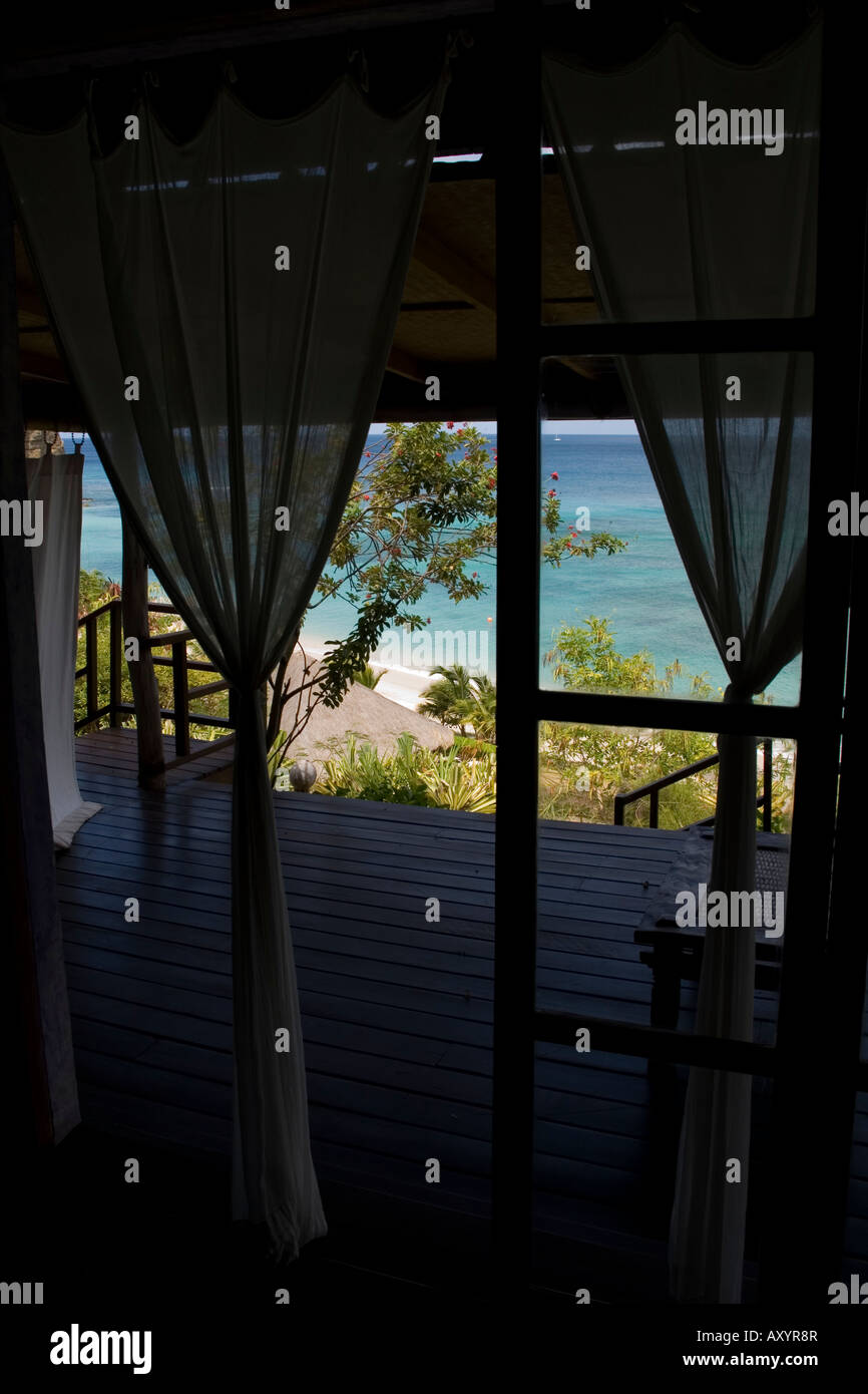 Laluna Grenada Karibik Resort Hotel Insel reisen Unterkunft Unterkünfte Villa Bungalow innen Ozean Aussicht Terrasse Balkon porc Stockfoto