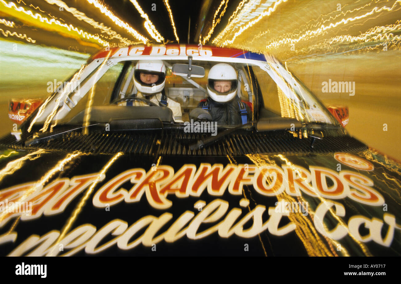 Rallye-Fahrer und Beifahrer Vauxhall Astra Rallye Auto Stadt Straße in Plymouth Devon uk Stockfoto