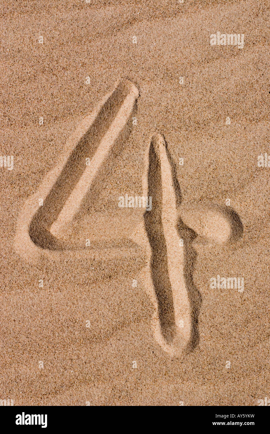 Zahlen auf Sand geschrieben Stockfoto