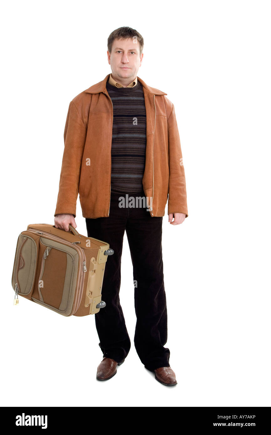 Mann in braune Jacke mit Koffer Stockfoto