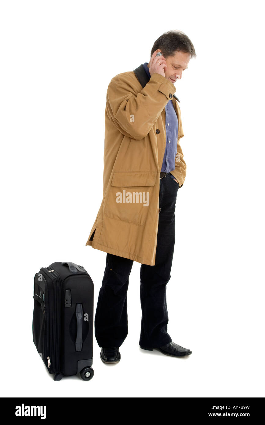 Mann in braune Jacke mit schwarzen Koffer Stockfoto