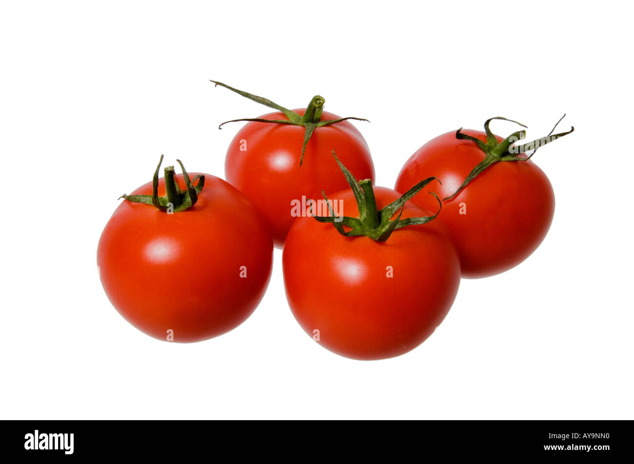 Vier Reifen, roten Tomaten auf weißem Hintergrund Stockfoto