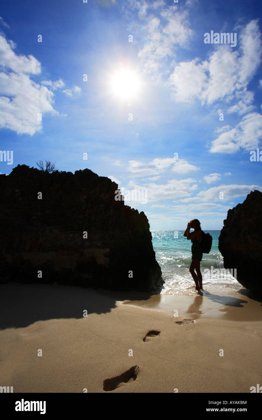 Silhouette einer Person an einem Strand Stockfoto