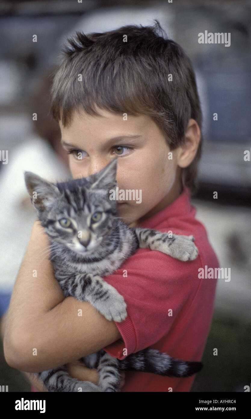 Art Mit Katze Auf Dem Arm Stockfoto