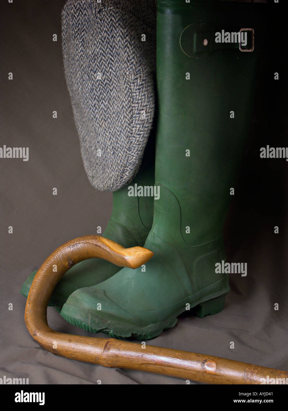 Gummistiefel und flache Kappe mit ein Hirte s Gauner Stockfotografie - Alamy