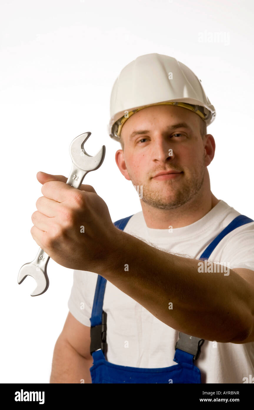 Construction Worker Holding Gabelschlüssel Stockfoto