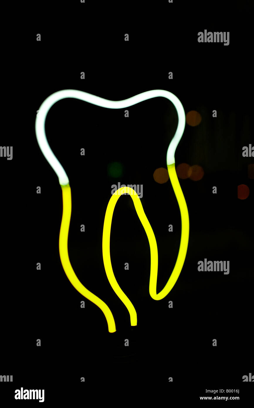 Leuchtreklame, Darstellung einer extrahierten Zahnes. Stockfoto