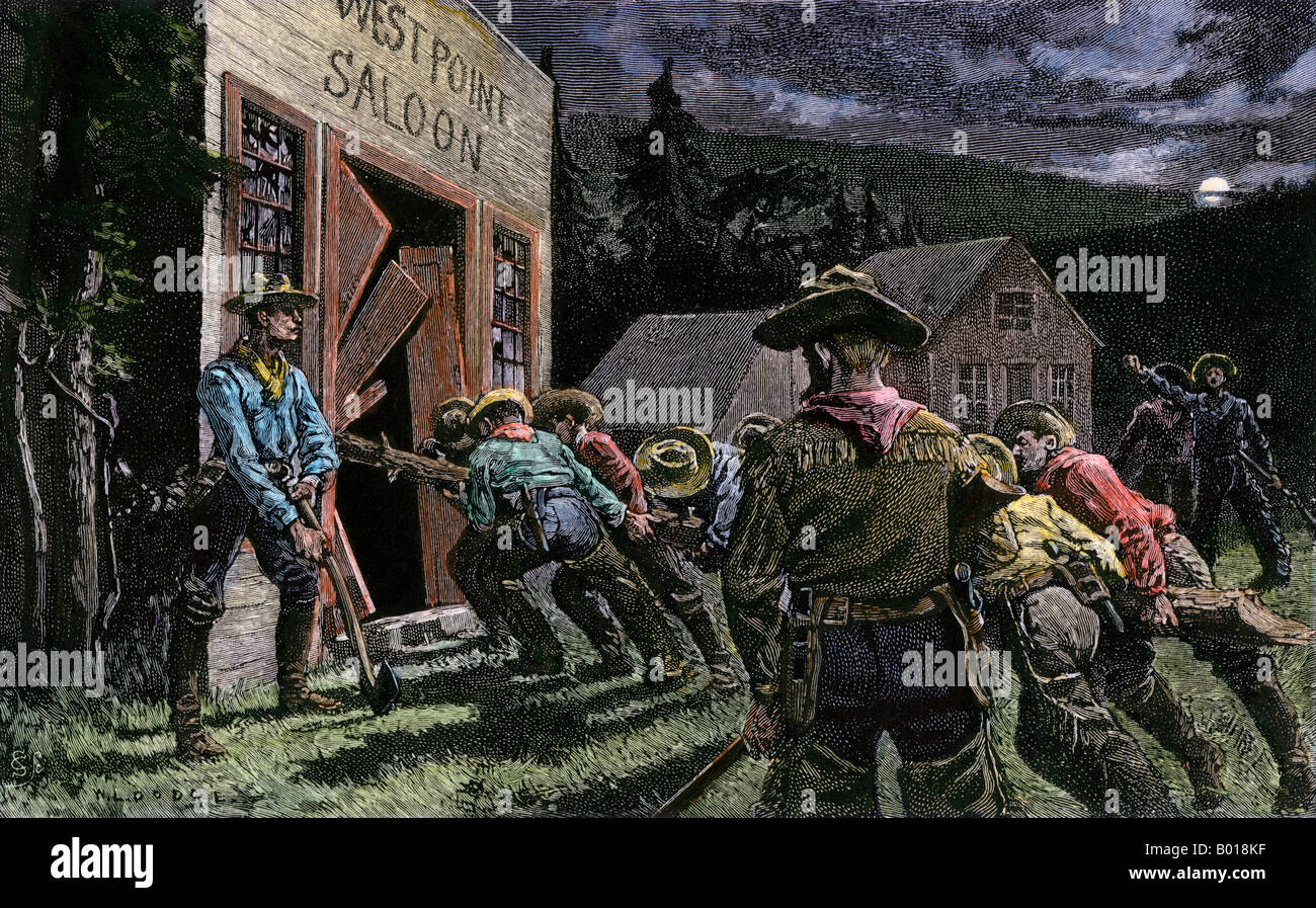 Western miners Zerschlagung in einen Saloon. Hand - farbige Holzschnitt Stockfoto
