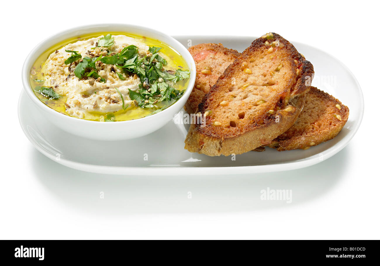 Humose Tomate verschmiert Brot Stockfoto