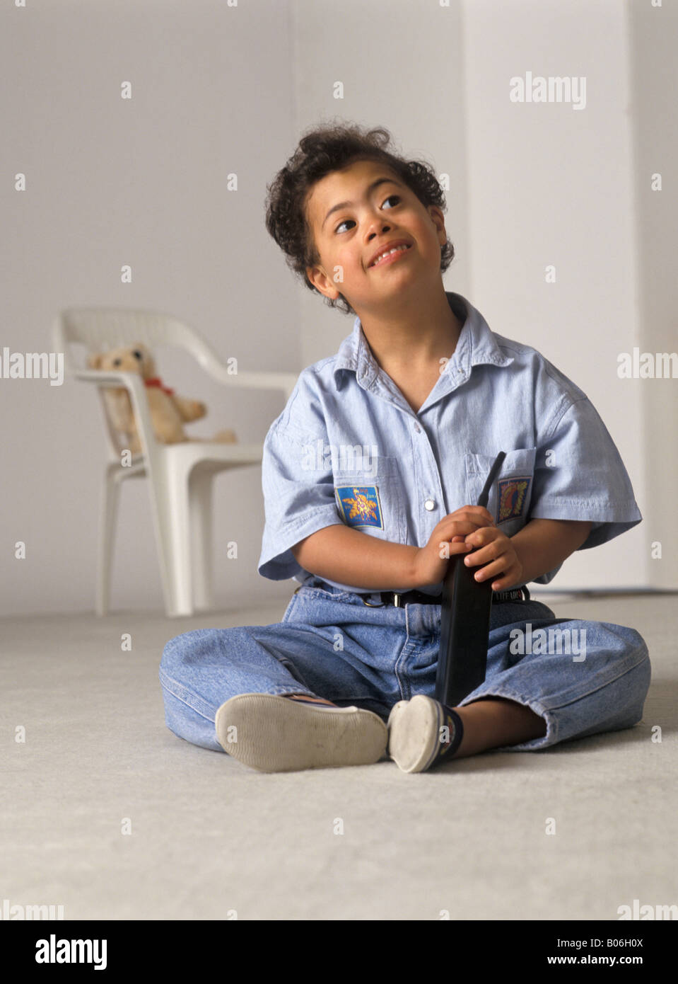 Kind mit Down syndrom Stockfoto