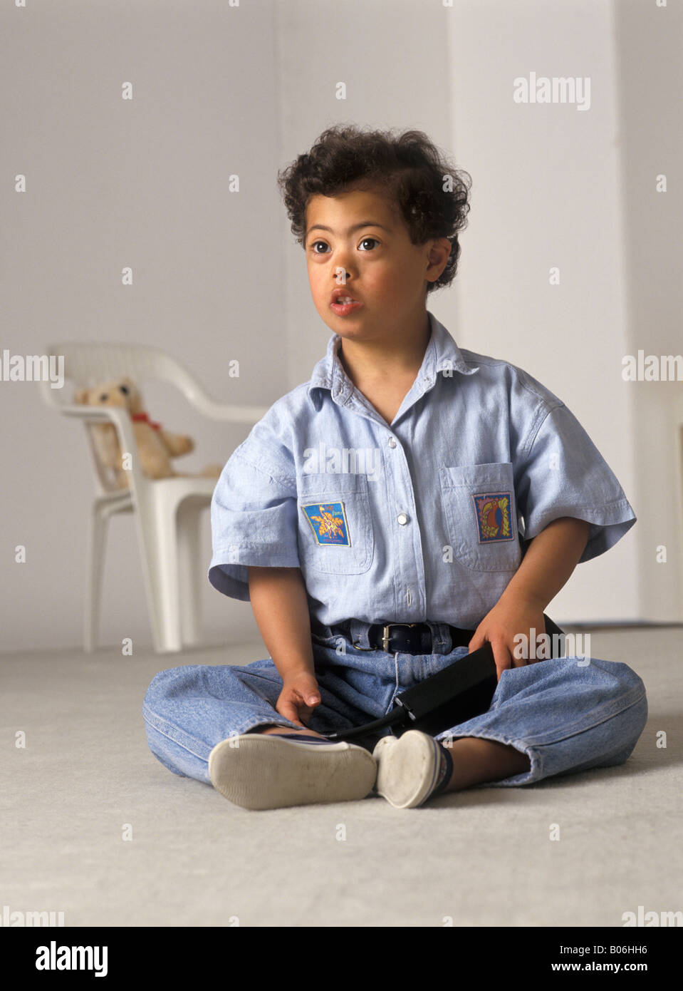 Kind mit Down syndrom Stockfoto