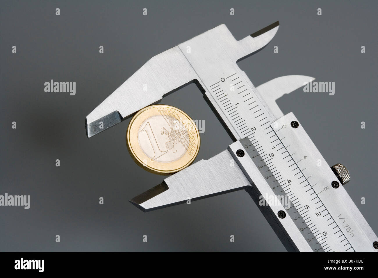 1-Euro-Münze im Regelfall Bremssattel Stockfoto