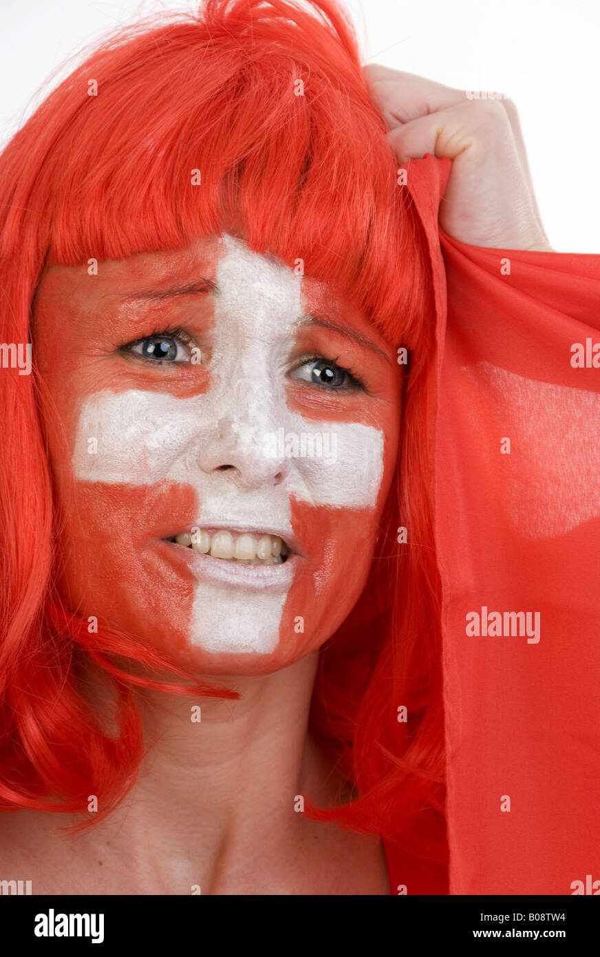 Frau als Fußball-Fan der Schweiz, an den Haaren reißen Stockfoto