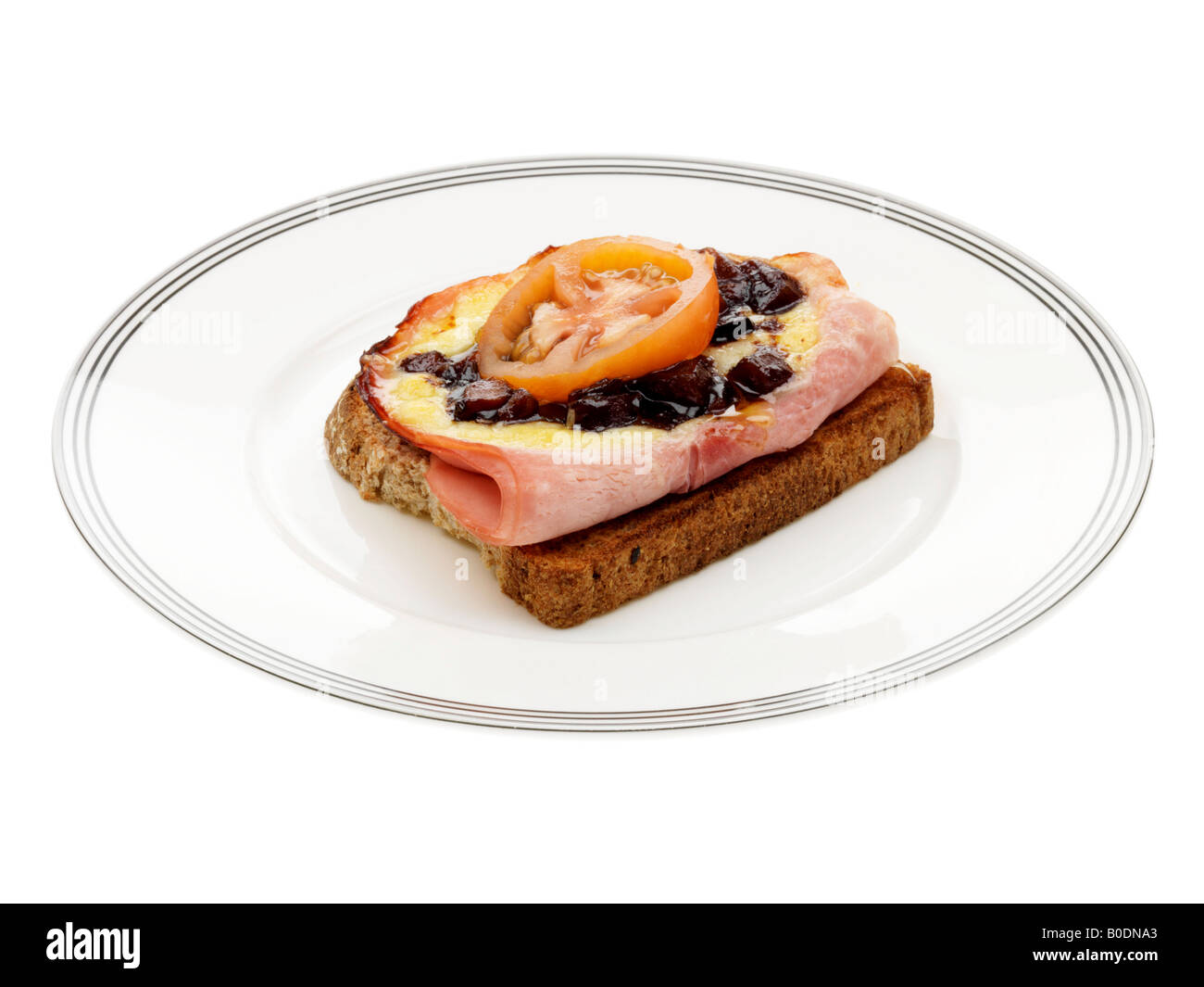 Käse, Schinken und Gurke auf Toast Stockfoto