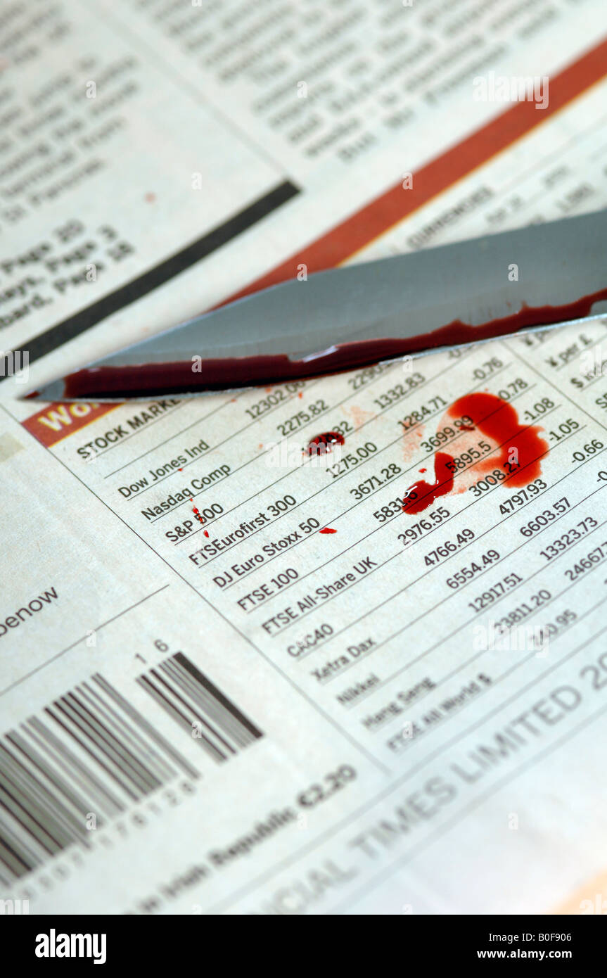 Messer und Blut auf den Finanzseiten Stockfoto