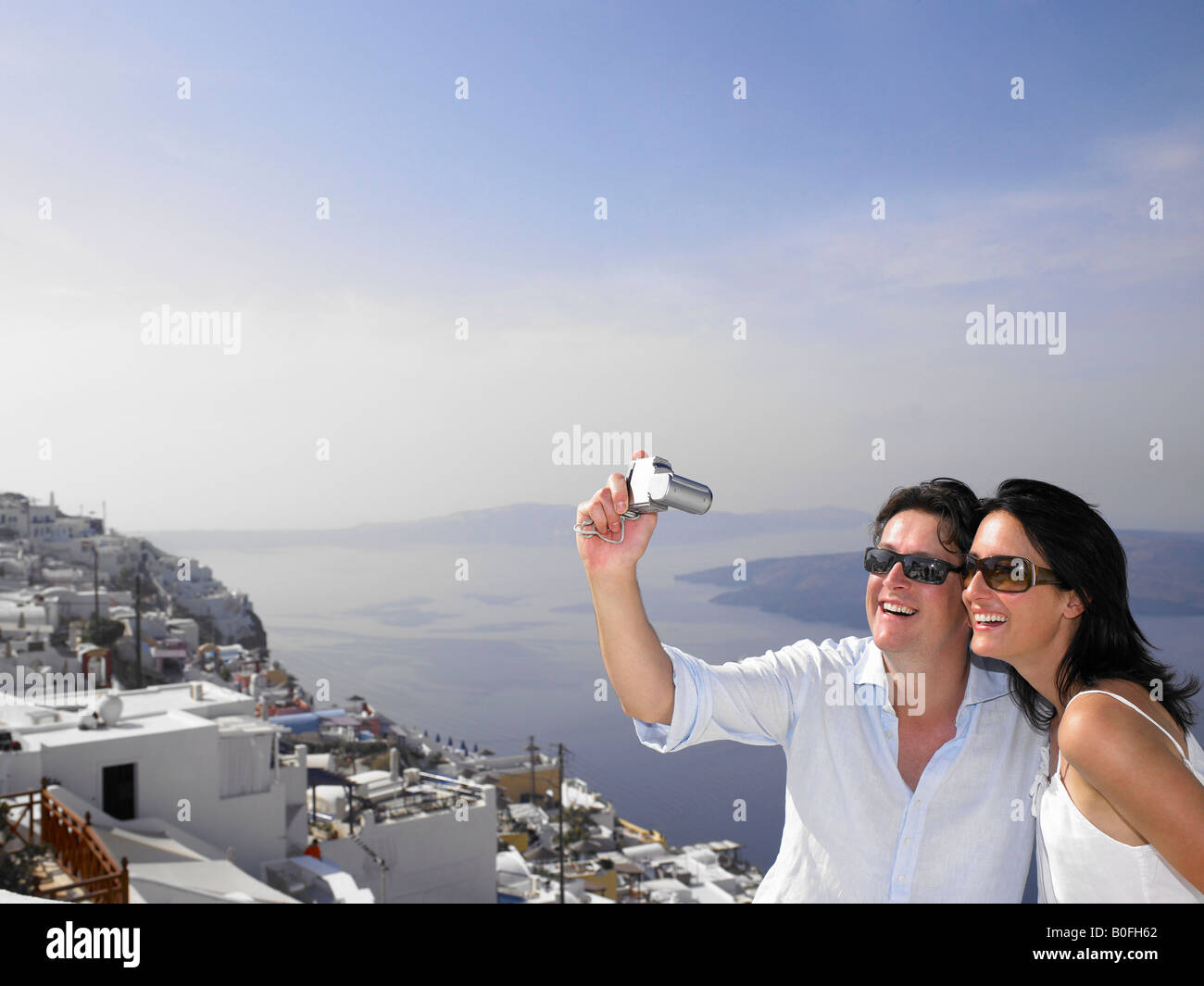 Paar fotografieren, Blick aufs Meer Stockfoto