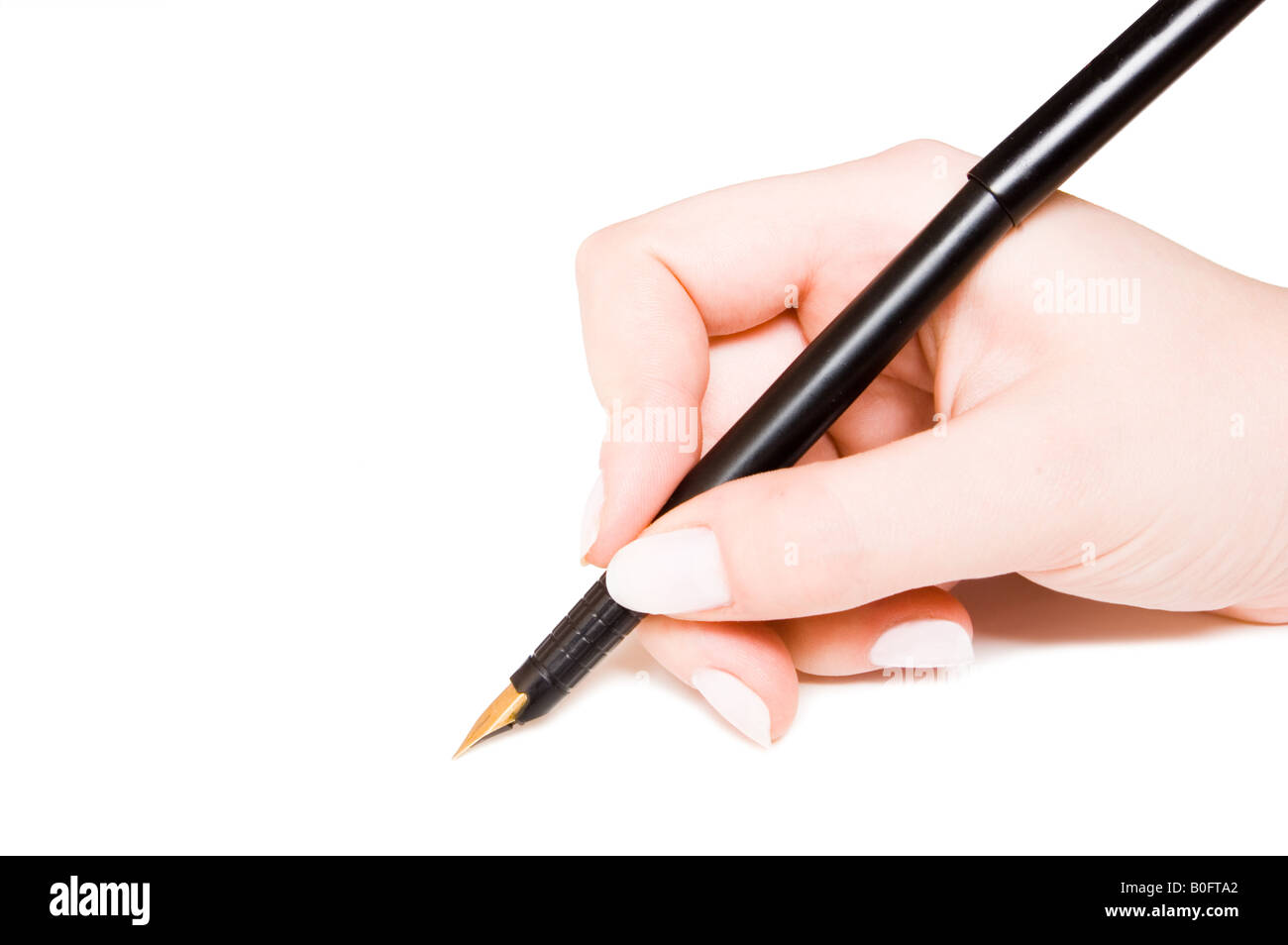 Stift und Hand auf weiß Stockfoto