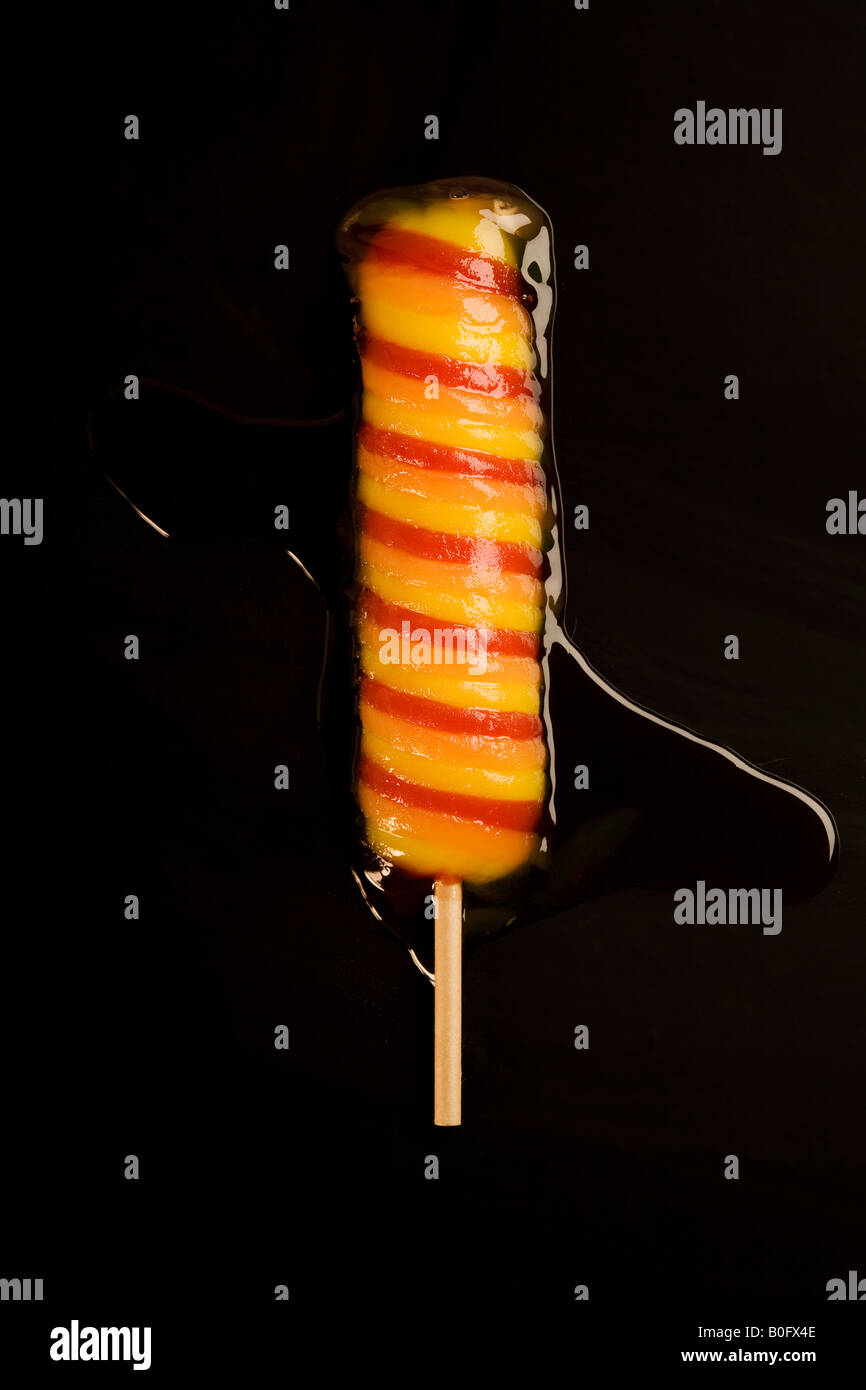 Gefrorenen Eis am Stiel schmelzen Stockfoto