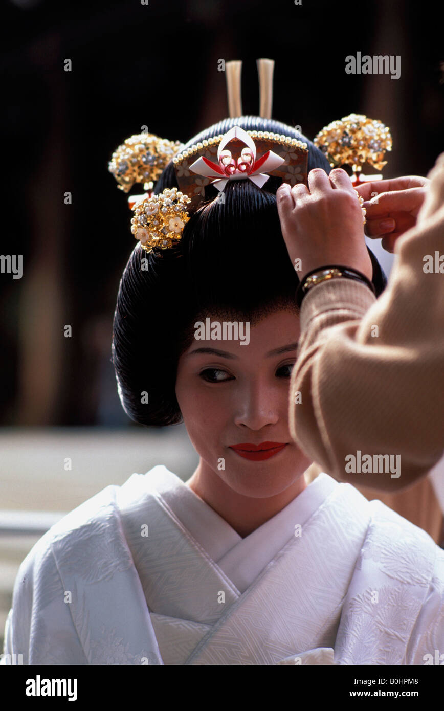 Eine Braut, immer bereit, ihr fotografieren am Hochzeitstag, Tokio, Japan. Stockfoto