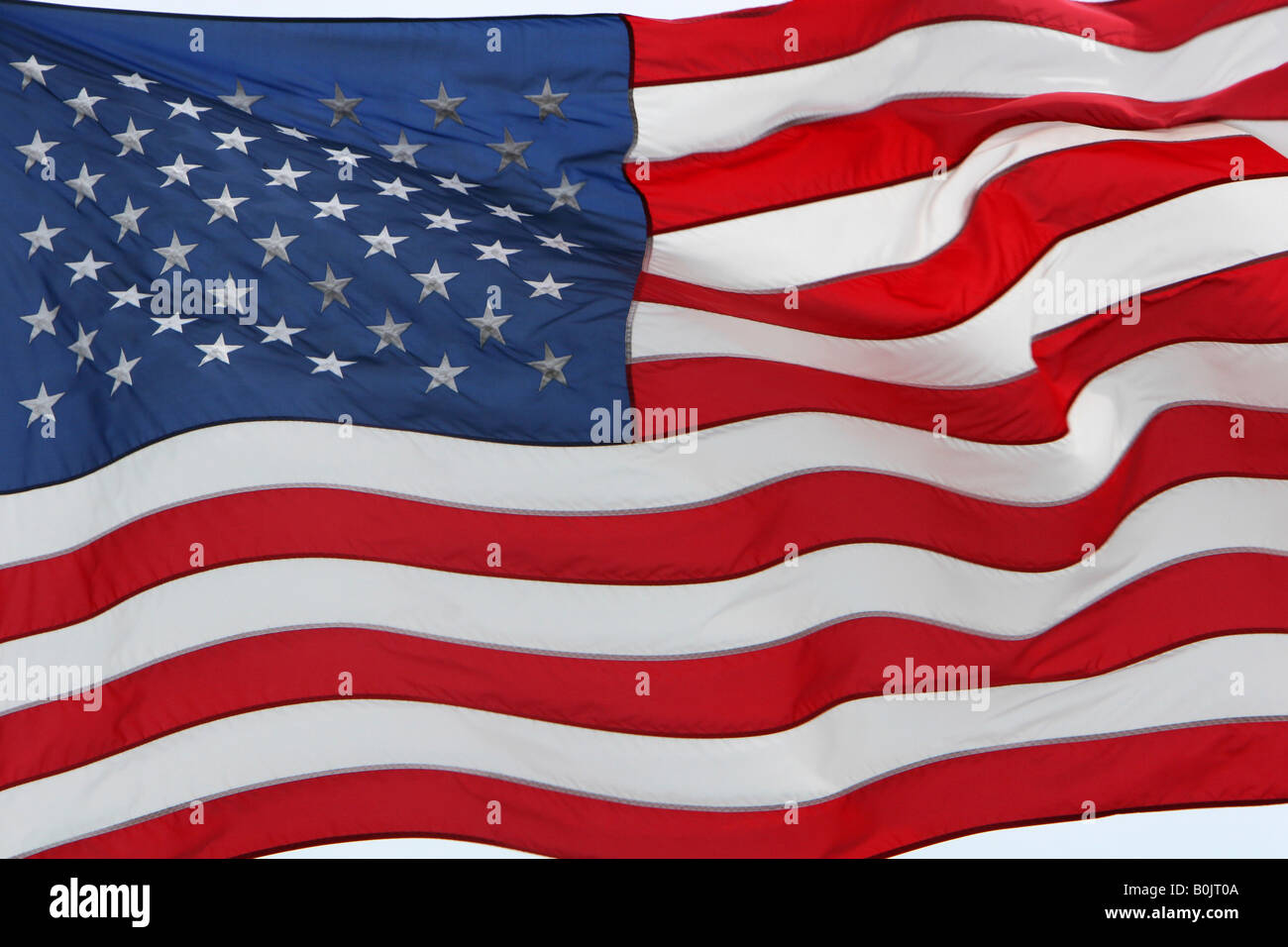 Rahmen füllen Schuss der amerikanischen Flagge im Wind flattern Stockfoto