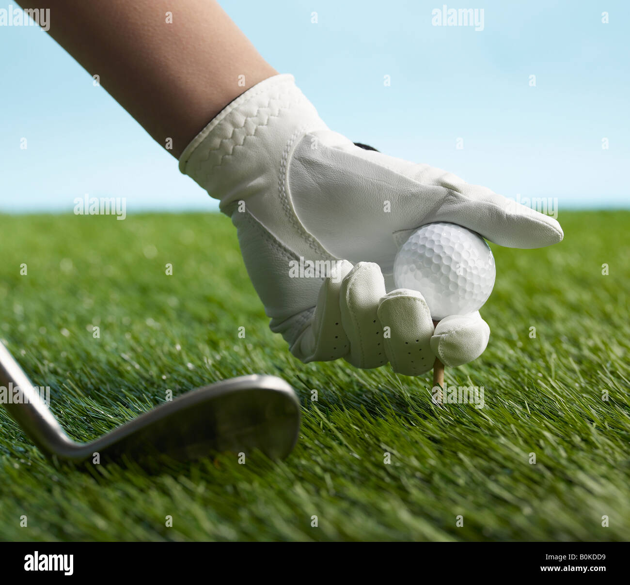 Golf Spieler, Golf Ball auf T-Stück Stockfoto