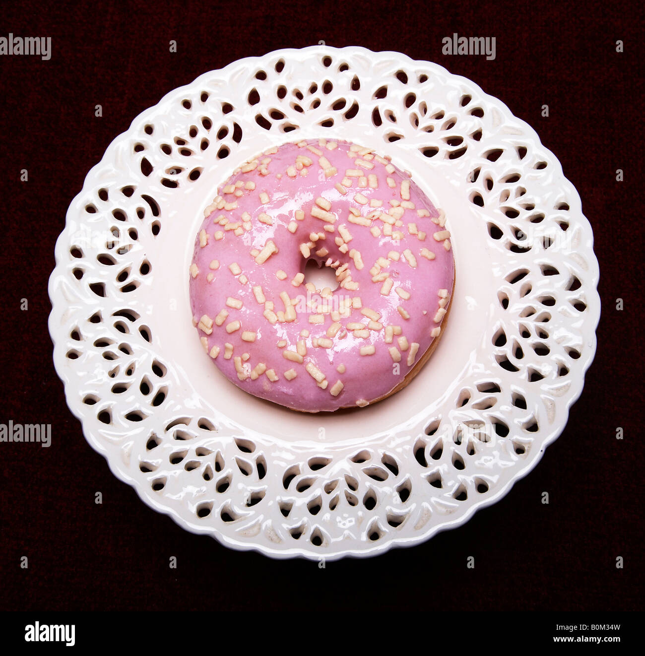 Rosa Krapfen in der Luft Stockfoto