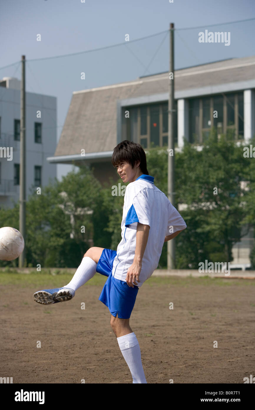 Fußball Spieler munter Stockfoto
