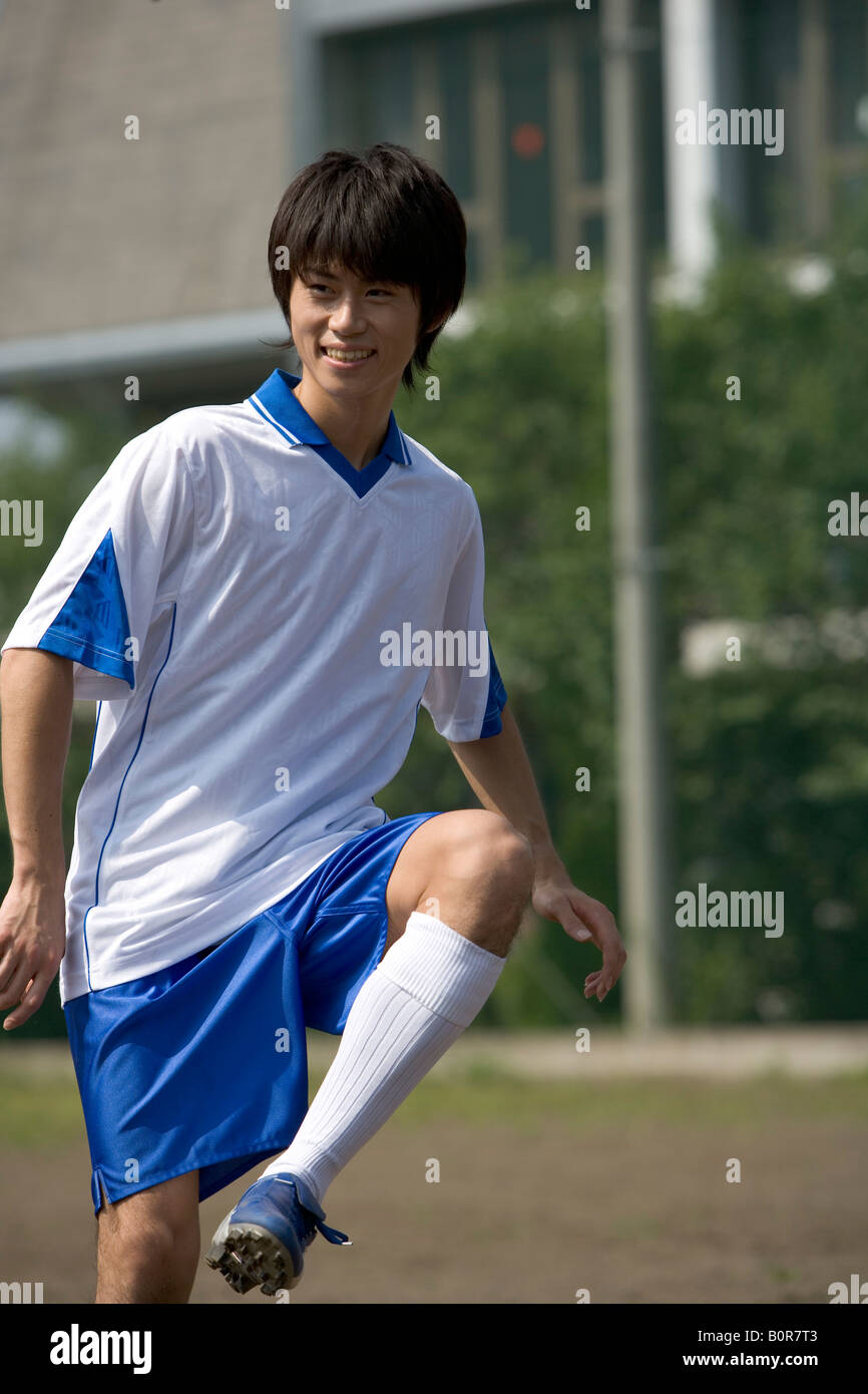 Fußball Spieler munter Stockfoto