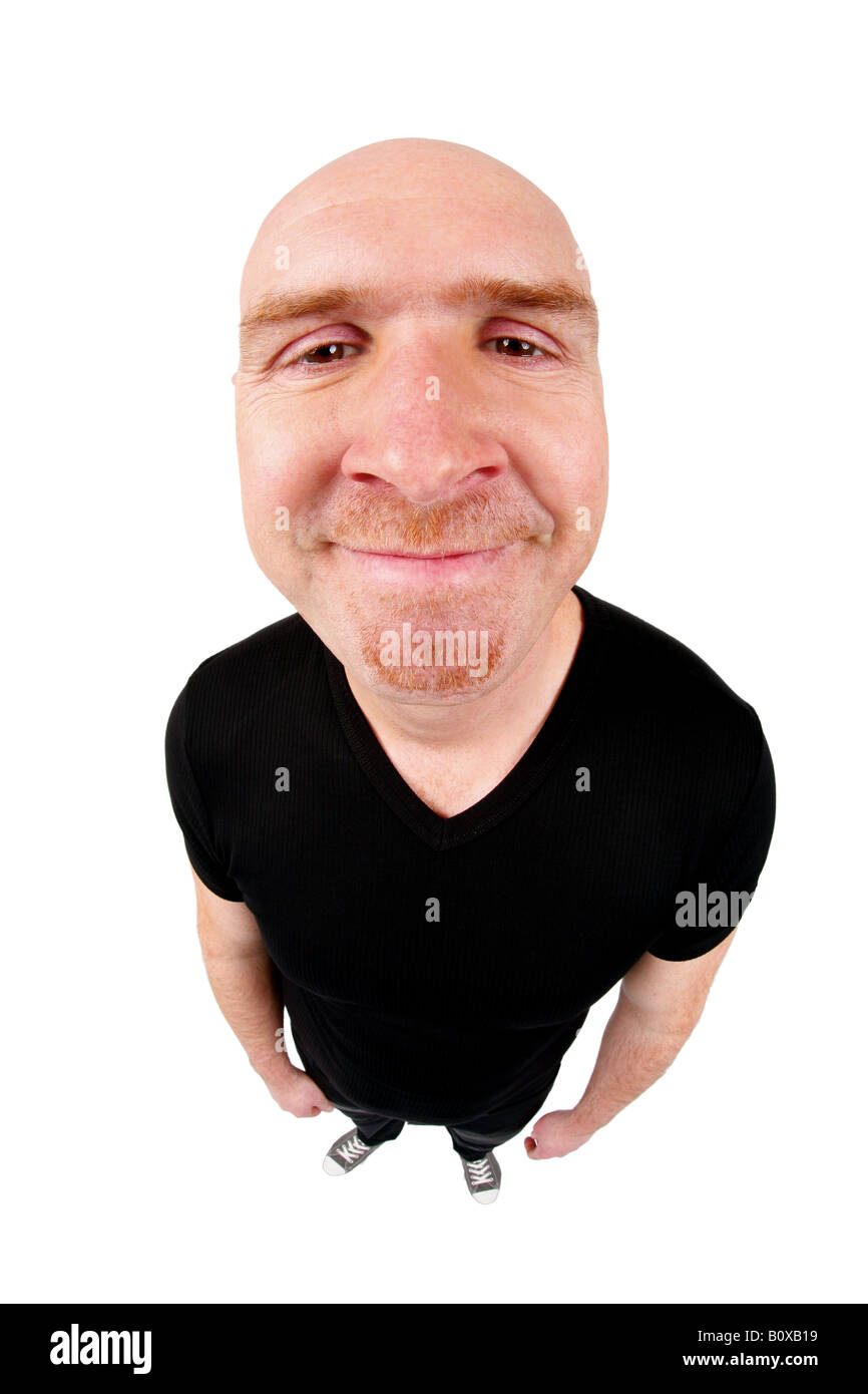 Leitung Glatzkopf dümmlich grinsend in die Kamera Stockfoto