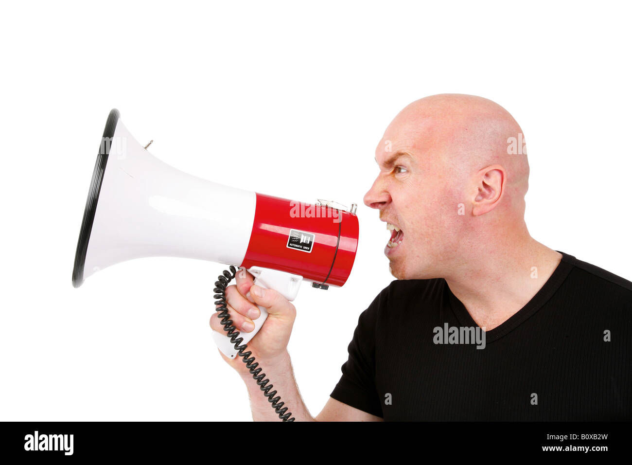 Leitung Glatzkopf brüllt in ein Megaphon Stockfoto