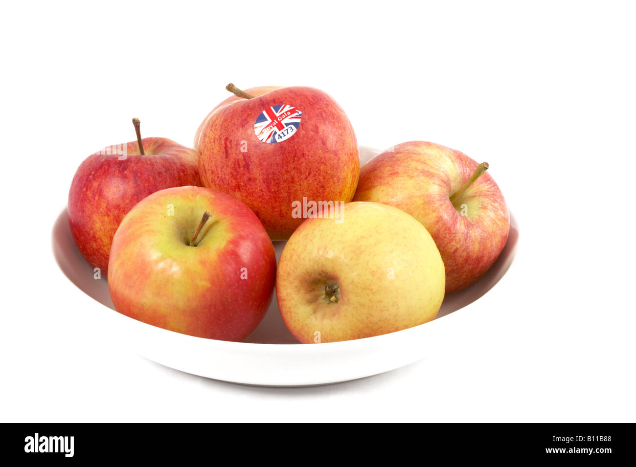 Äpfel in eine Schüssel weiß Stockfoto