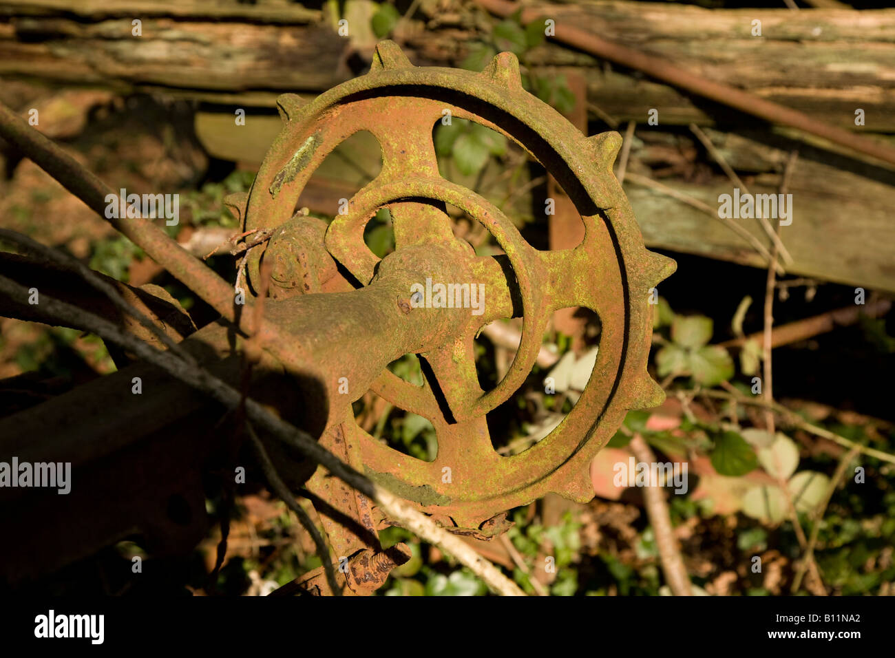 Kettenrad auf alte Landmaschinen Stockfoto