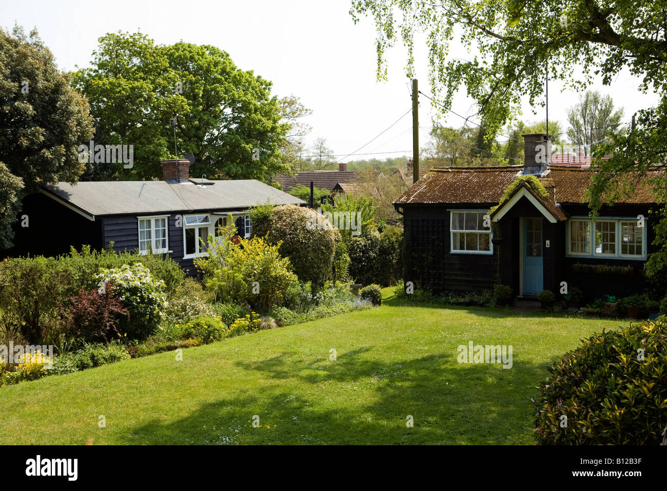 UK England Suffolk Aldeburgh Thorpeness Lakeside Avenue original 1920er Jahren hölzernen Ferienbungalows Stockfoto