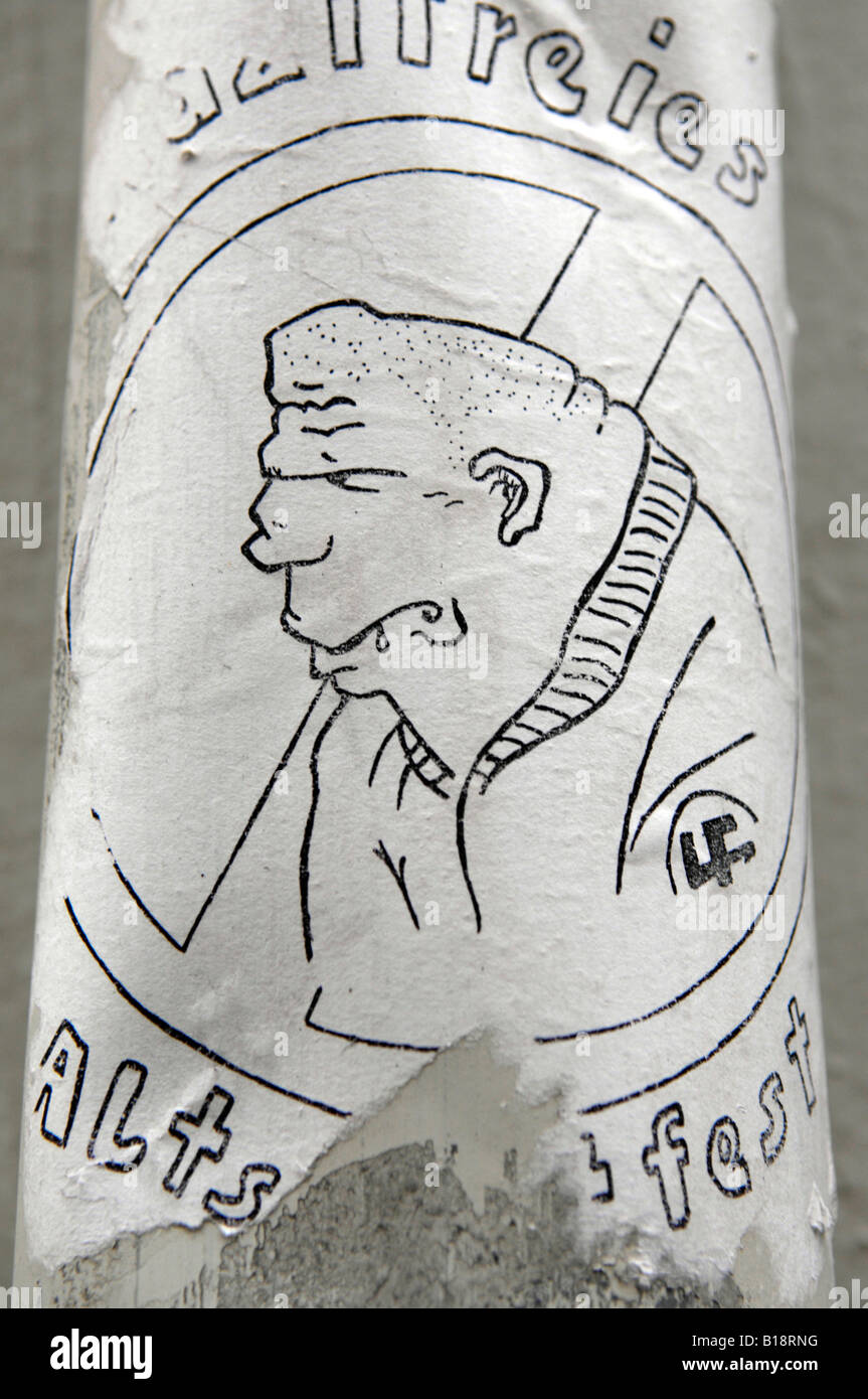 Anti-Nazi-Graffiti Aufkleber Thug Meathead Idioten schwachsinnige anti-faschistischen deutschen Aufkleber auf Lampost Goslar Harz Mountains Stockfoto