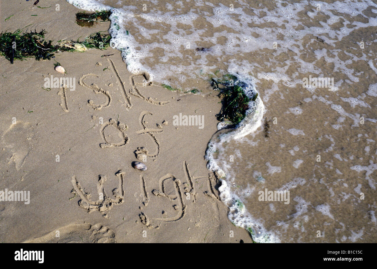 Isle Of Wight, geschrieben in den Sand am Strand Stockfoto