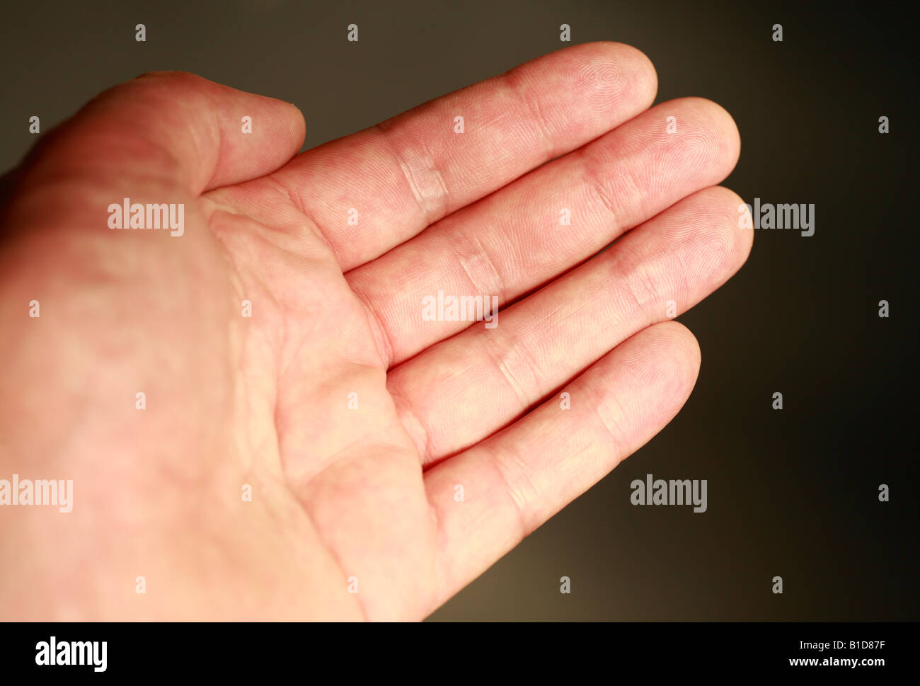 Ein Mann der offenen Handfläche. Stockfoto