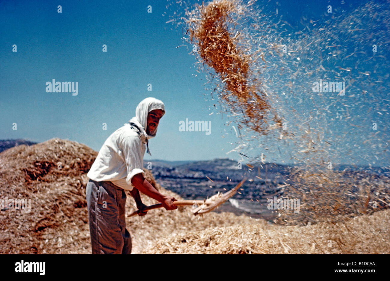 Landwirt Worfeln Stockfoto