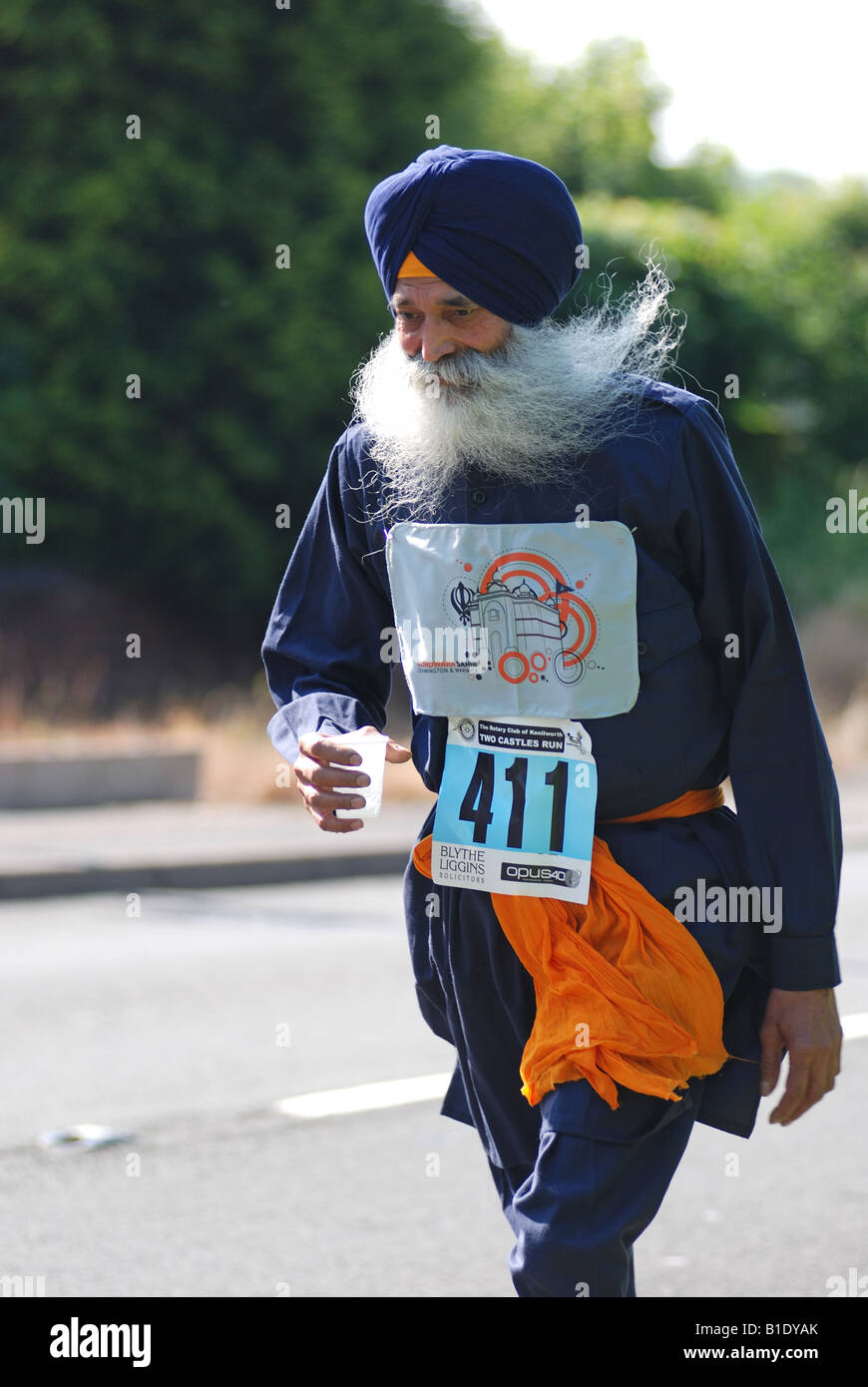 Sikh Mann in 10 k Straßenrennen, UK Stockfoto