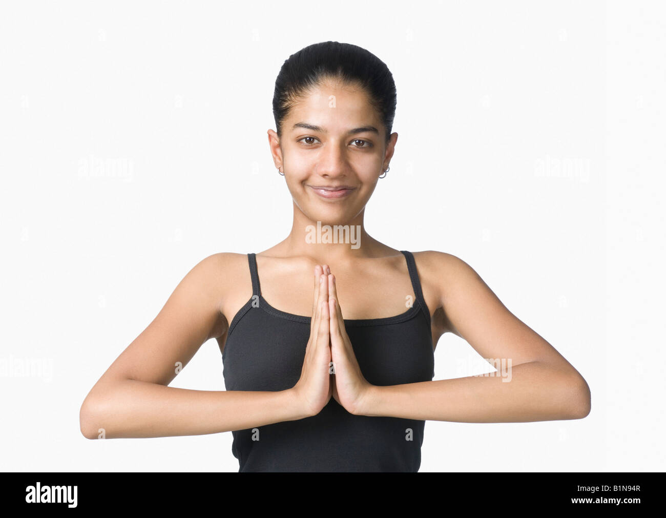 Porträt einer jungen Frau, Yoga zu praktizieren Stockfoto