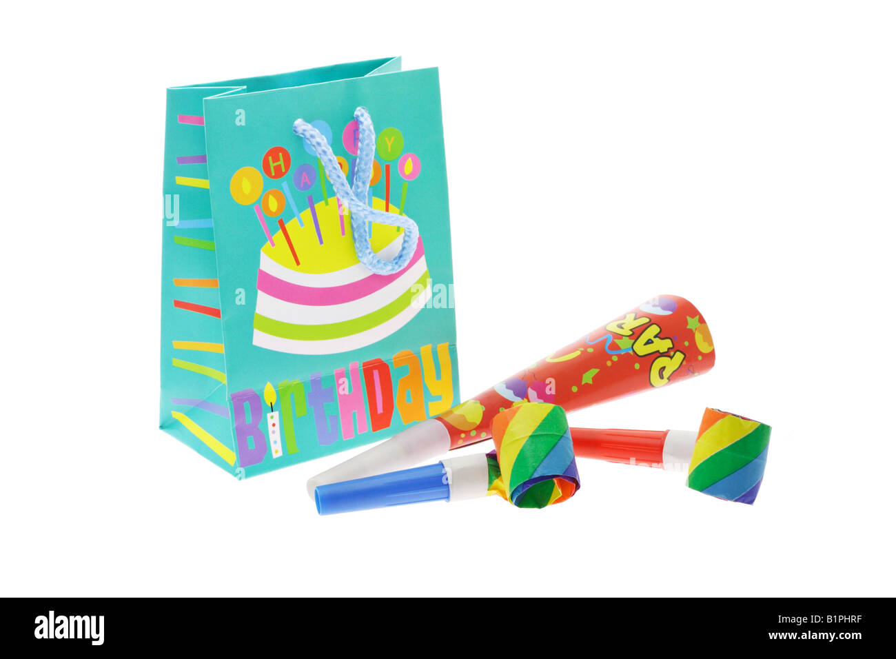 Buntes Geschenk Tasche und Party Gebläse auf weißem Hintergrund Stockfoto