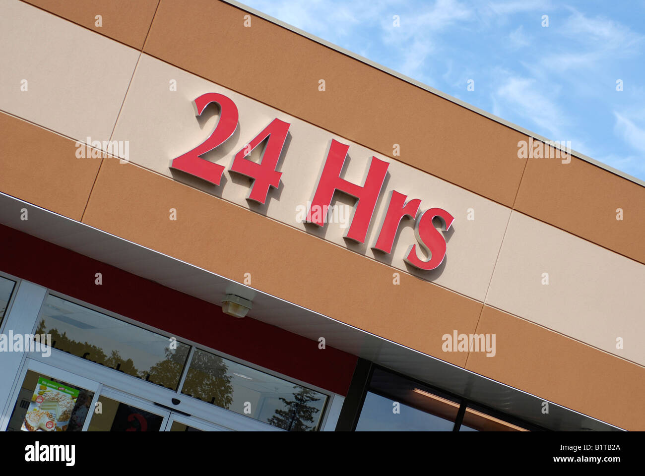 24 hrs, Laden/Supermarkt Front-Eingang Stockfoto