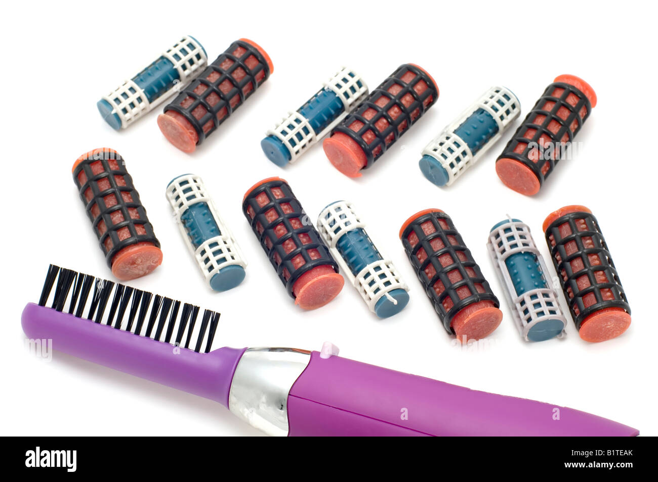 Objekt auf weißen farbigen haircurlers Stockfoto