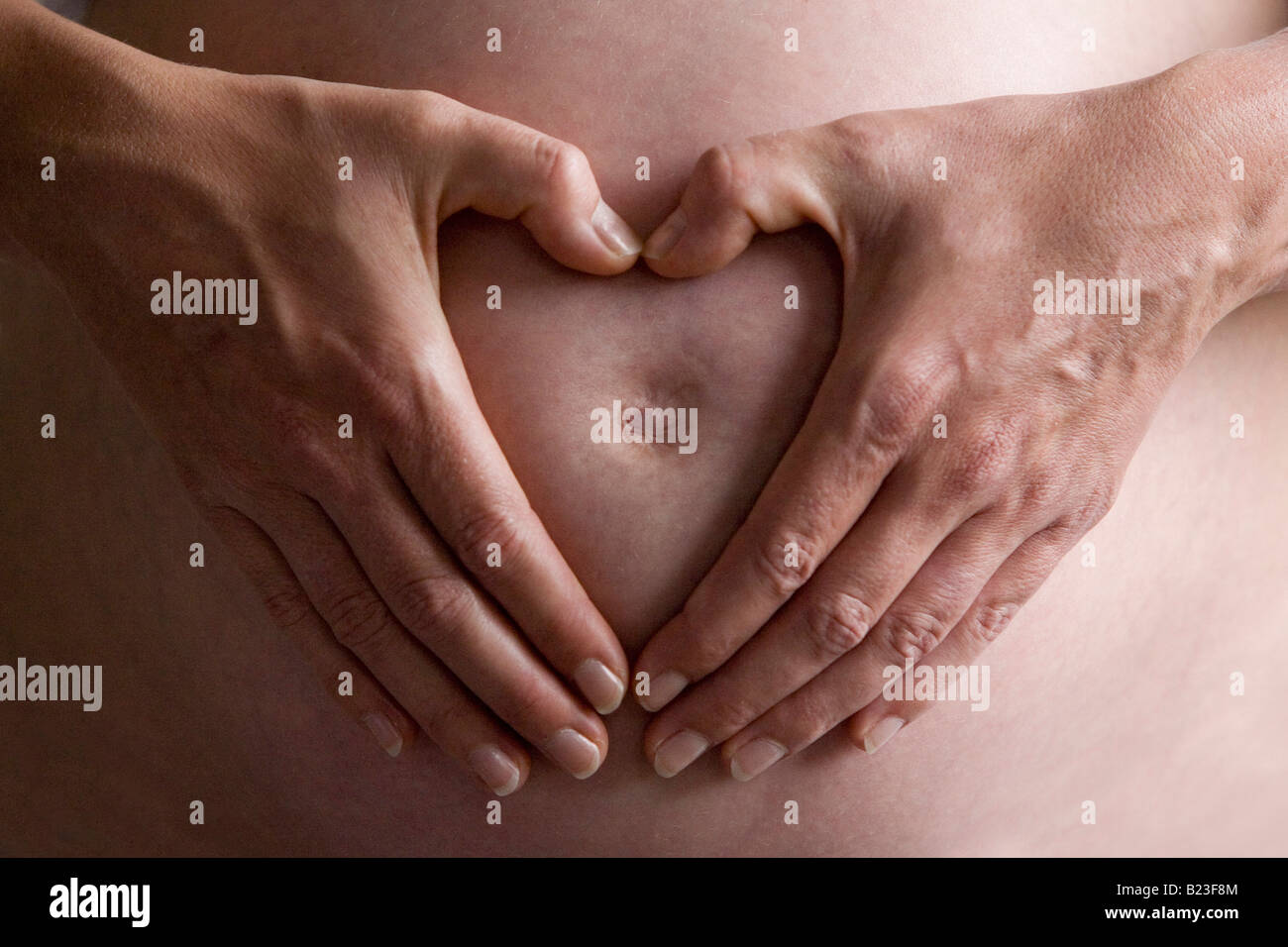 Frauen schwer mit Kind Stockfoto