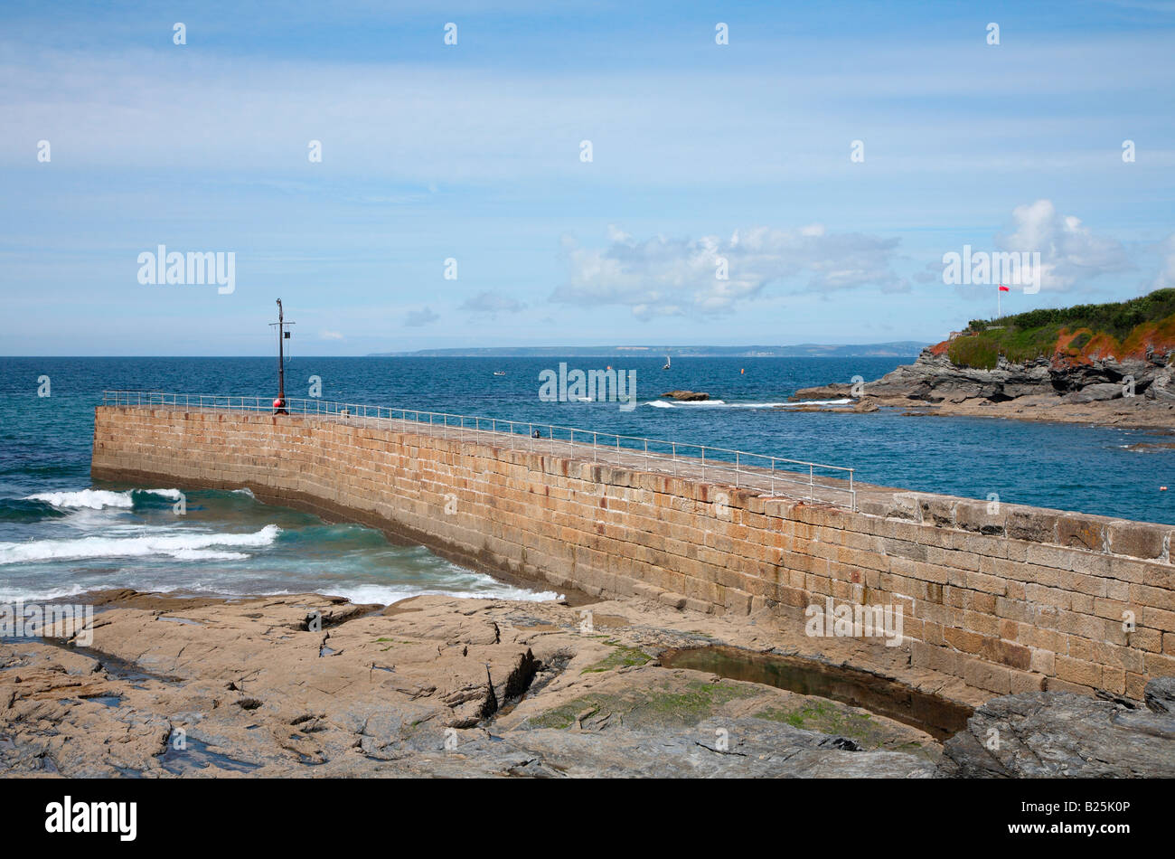 Der Granit Stein Pier in Porthleven, Cornwall UK. Stockfoto